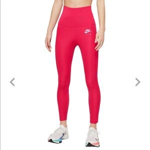 Cute, bright pink Nike leggings. Size XS. Mesh on back of the leg, gently used.